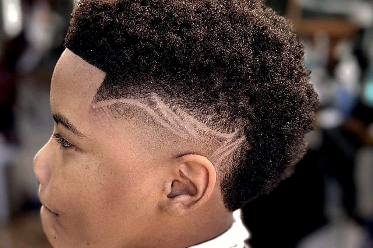 Close-up kids skin fade and lineup detail from a Vanzant lounge cut