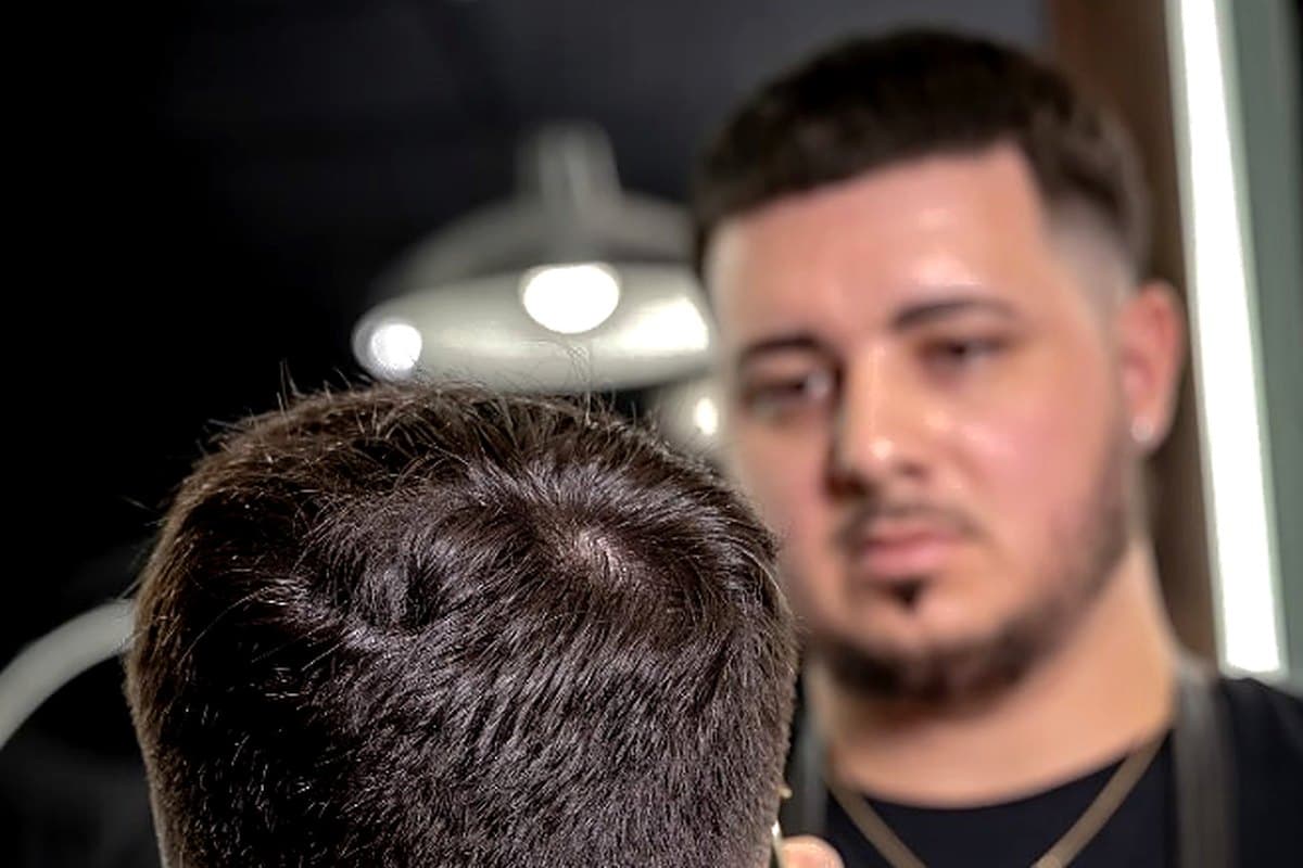 Close-up skin fade detail finished at Vanzant Barbershop Lounge
