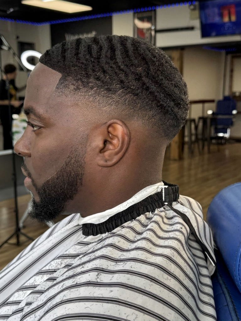360 waves with high skin fade and sharp lineup in profile