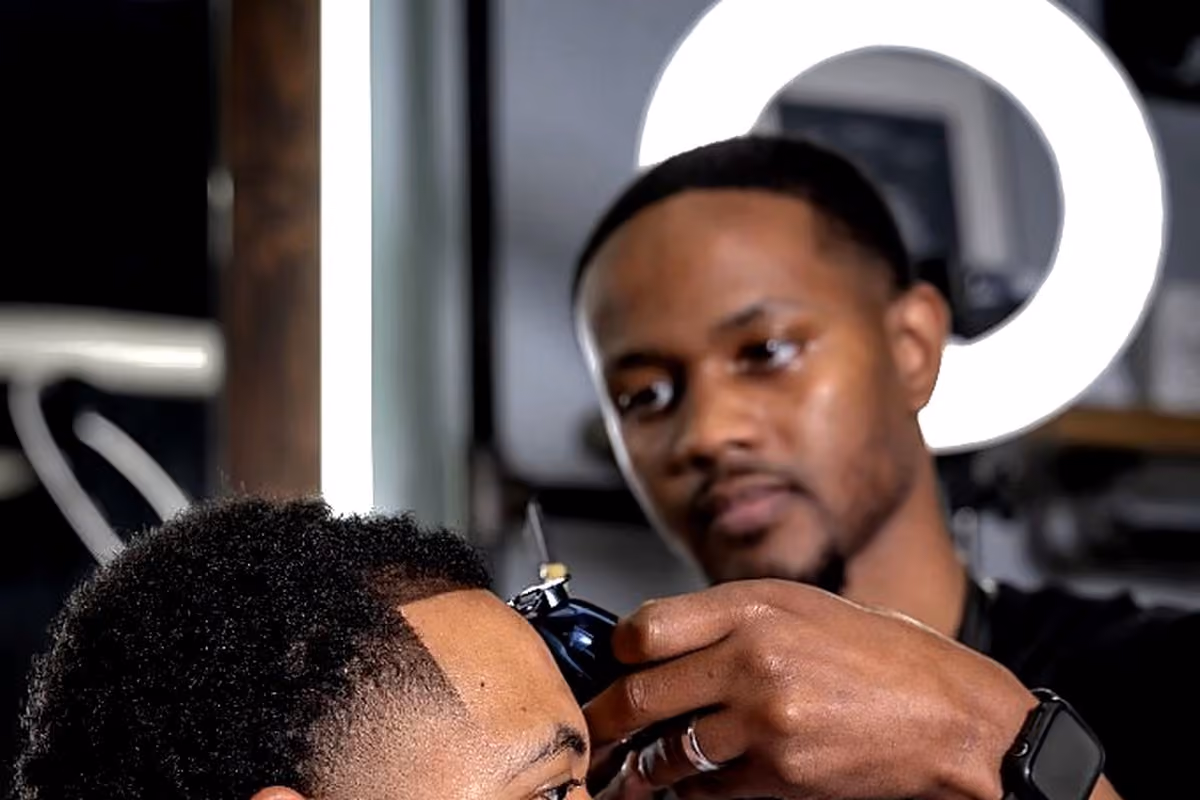 Precision lineup with detailers at Vanzant Barbershop Lounge in Tupelo