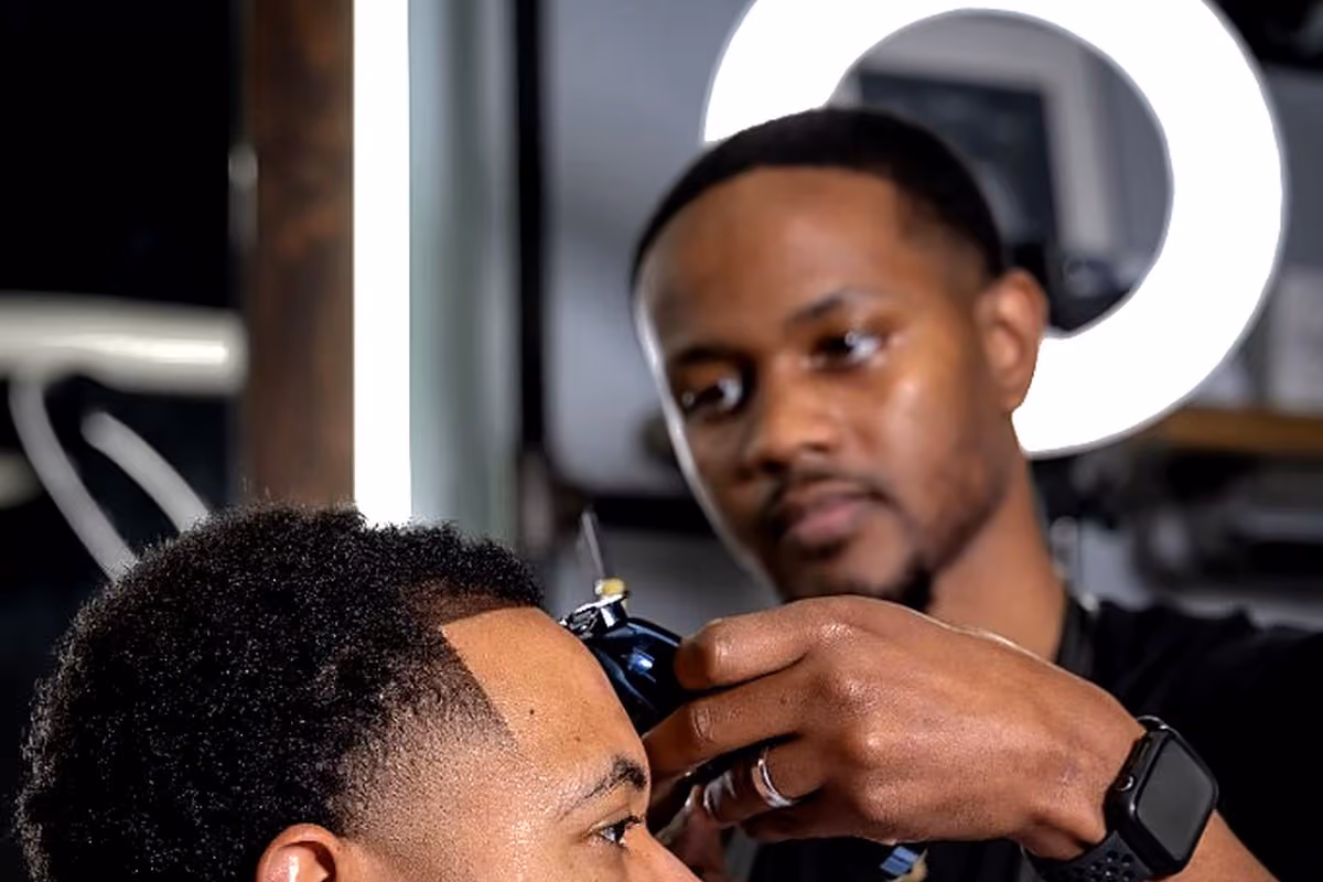 Precision lineup with detailers at Vanzant Barbershop Lounge